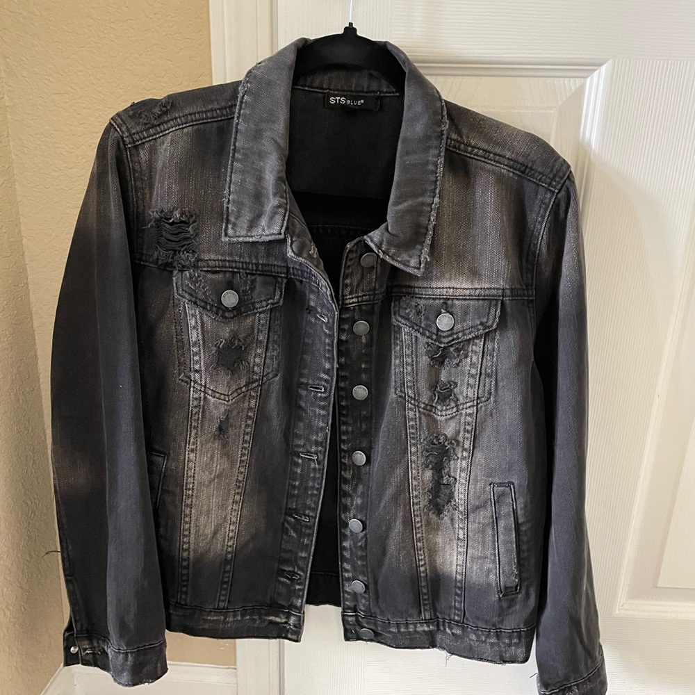 Distressed denim jacket